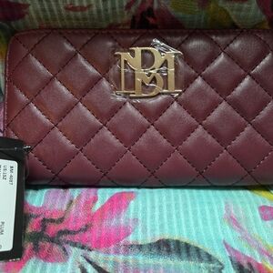 Badgley Mischka Purple Quilted Wallet with Gold Emblem